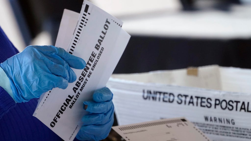 Absentee ballot issues may disenfranchise thousands of metro Atlanta voters, lawsuit claims — Roswell Community news